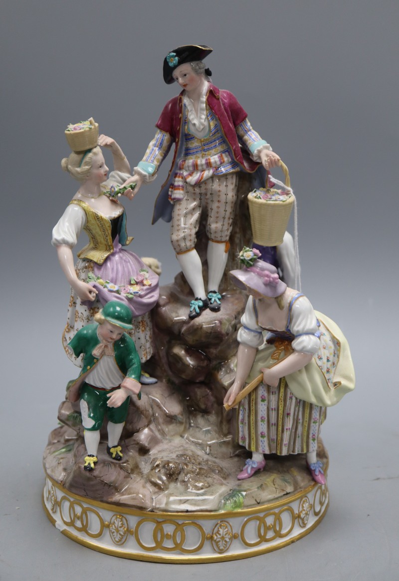 A 19th century Meissen gardening group, height 29cm, model D97